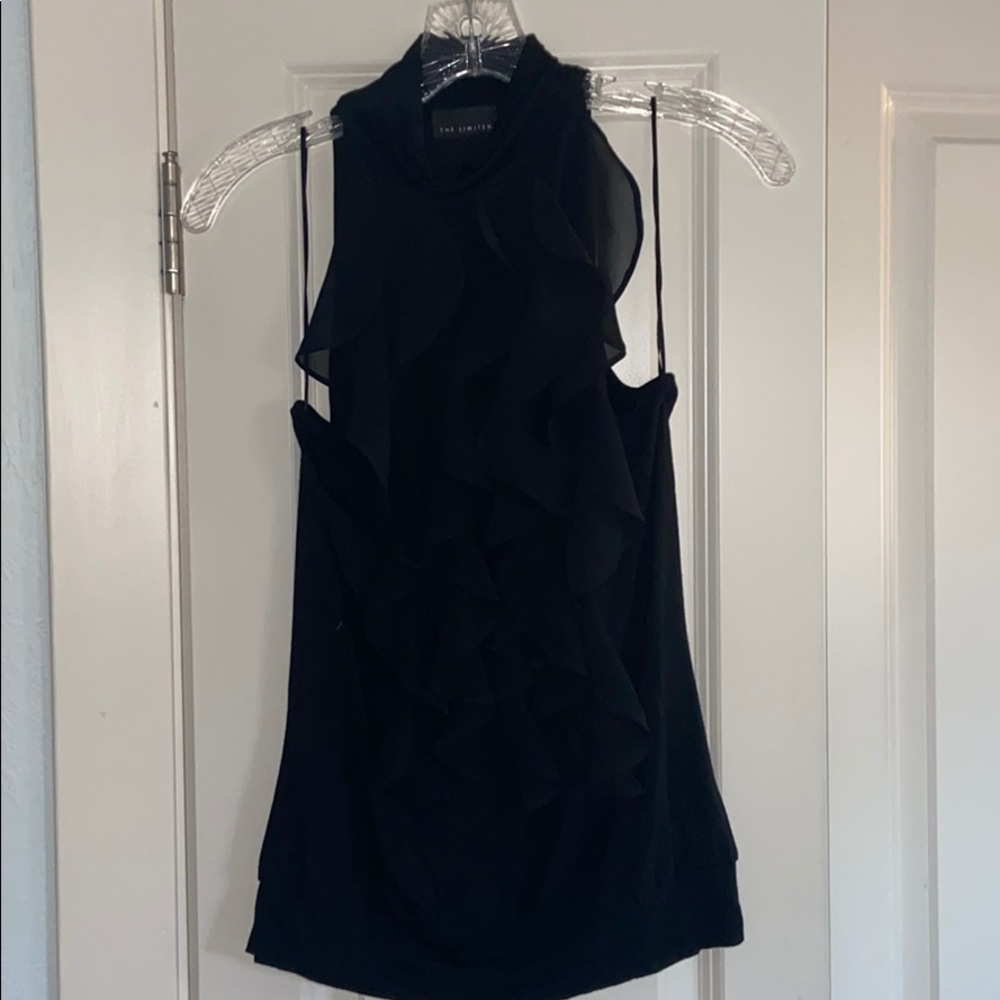 Ruffle detail turtleneck sleeveless blouse